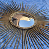 Miroir soleil vintage Chaty Vallauris A.M signé avec oeil de sorcière Diam 83 cm