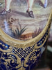 PAIRE DE VASES. PORCELAINE ÉMAILLÉE AVEC RELIEF. SEVRES. XIX ÈME SIÈCLE.