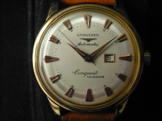RARE Montre ancienne vintage Longines Conquest Calendar en or 18 K