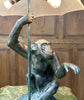 Max Le Verrier, "La pluie", Lampe singe en régule à patine verte Epoque Art Déco