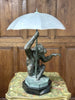 Max Le Verrier, "La pluie", Lampe singe en régule à patine verte Epoque Art Déco