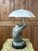 Max Le Verrier, "La pluie", Lampe singe en régule à patine verte Epoque Art Déco