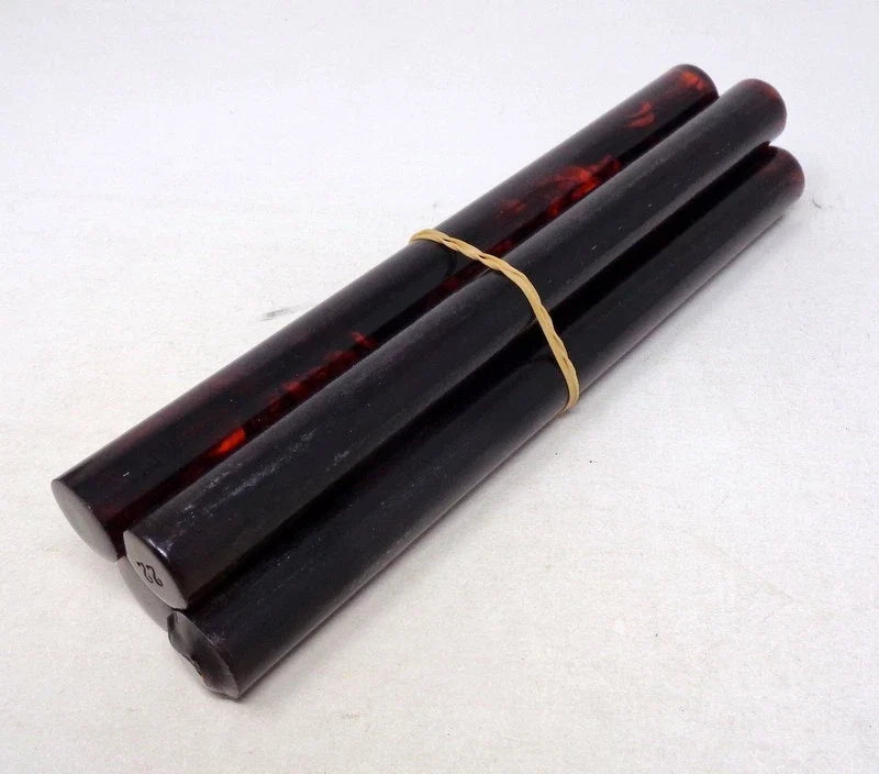 Lot de 4 batons anciens en bakelite - 503 grams