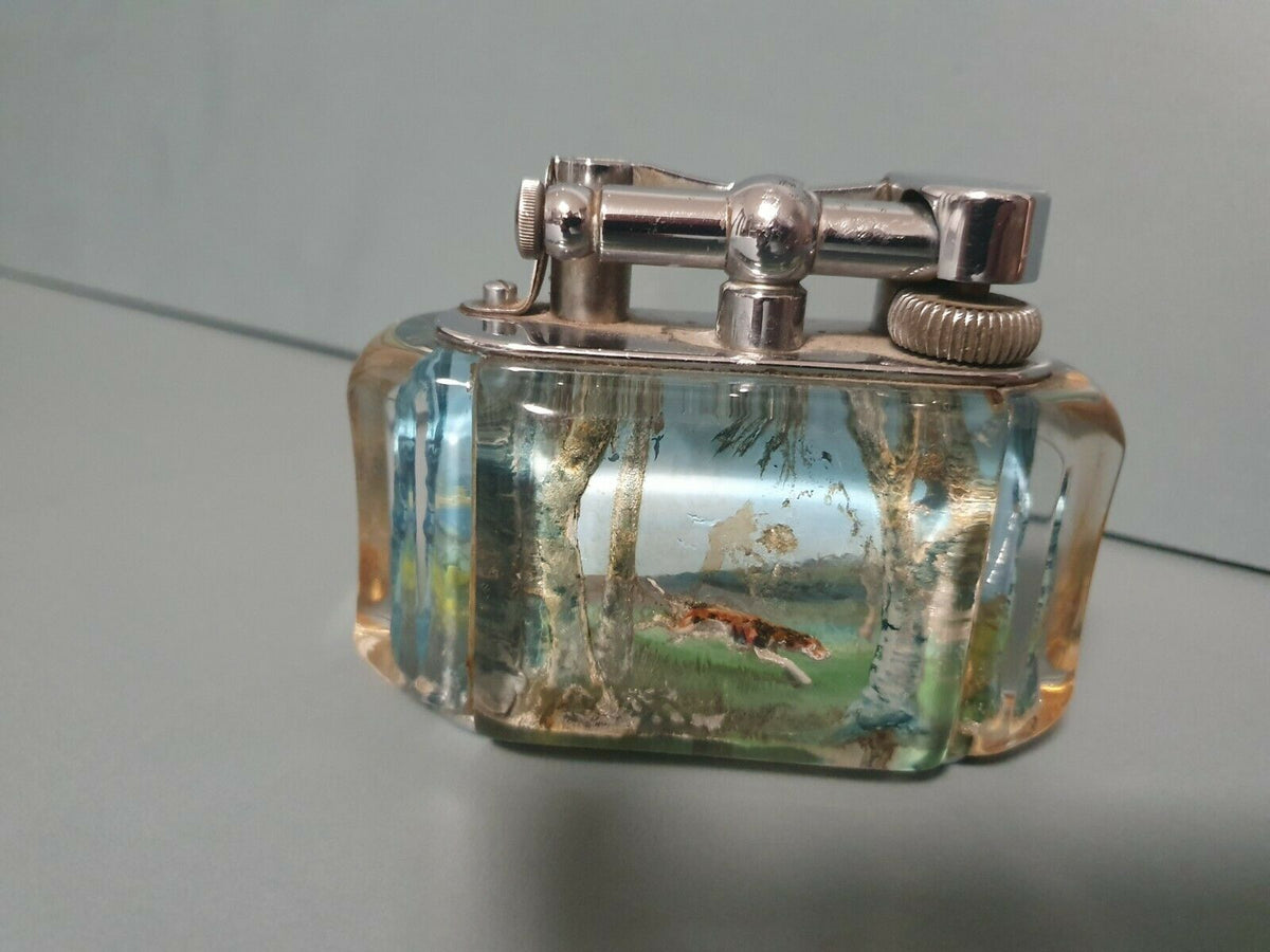 BRIQUET DUNHILL TRES RARE SCENE DE CHASSE CAVALIER ET CHIEN.