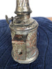 Ancienne lampe Pigeon, décor feuilles de chêne, plaque rapportée