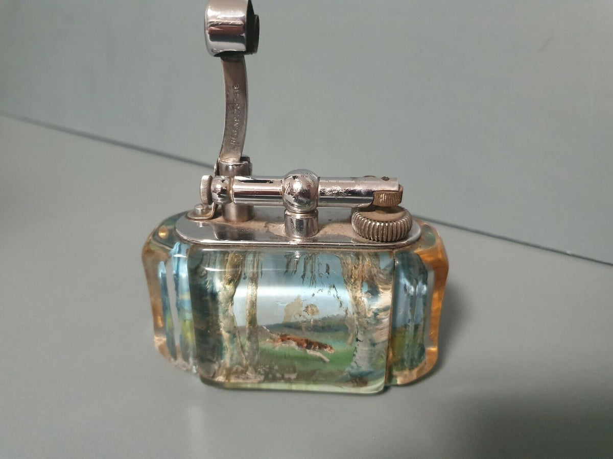 BRIQUET DUNHILL TRES RARE SCENE DE CHASSE CAVALIER ET CHIEN.